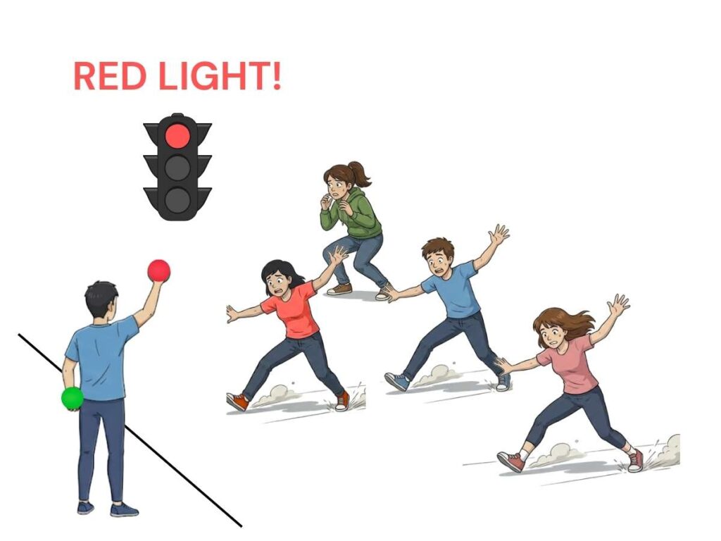 Red Light Green Light running game for physical education with players sprinting on green light and freezing on red light